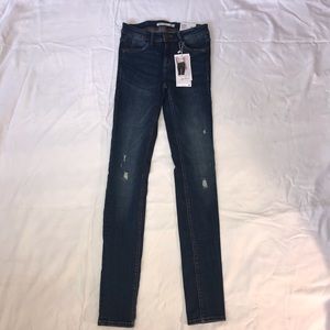 Zara jeans with small rips size 2